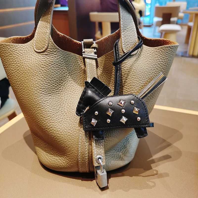 Soft Leather Pony Pendant Car Pendant Key designer Pendant Handmade Leather New Rivets War Horse Bag Charm Bag Charm Leather XJ250822