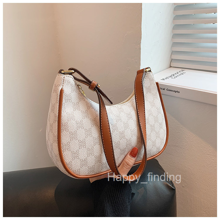 Small bag female new fashion French minority design advanced feeling single shoulder armpit bag handle stick bag