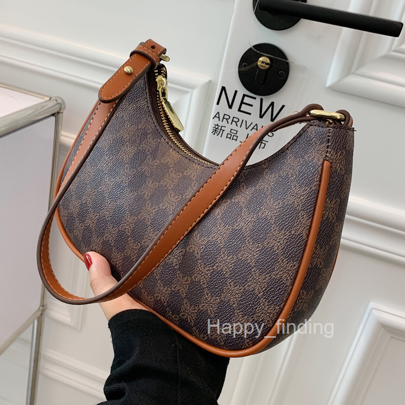 Small bag female new fashion French minority design advanced feeling single shoulder armpit bag handle stick bag
