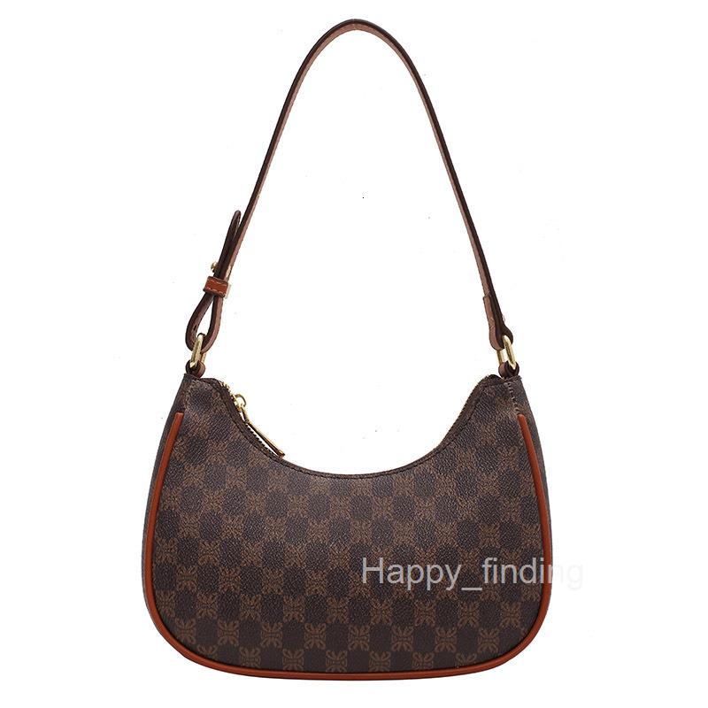 Small bag female new fashion French minority design advanced feeling single shoulder armpit bag handle stick bag