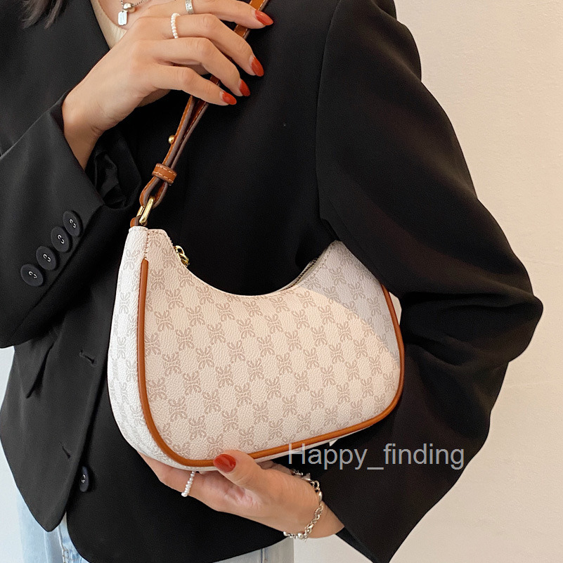 Small bag female new fashion French minority design advanced feeling single shoulder armpit bag handle stick bag