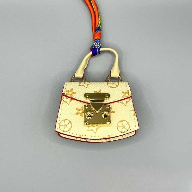 New Mini Bag Small Pendant Fan Bag Mouth Red Envelope Car Key Bag Buckle Pendant Earphone Bag Presbyopia Mini Bag Z250822