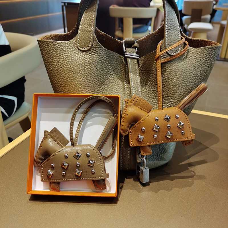 Soft Leather Pony Pendant Car Pendant Key designer Pendant Handmade Leather New Rivets War Horse Bag Charm Bag Charm Leather XJ250822