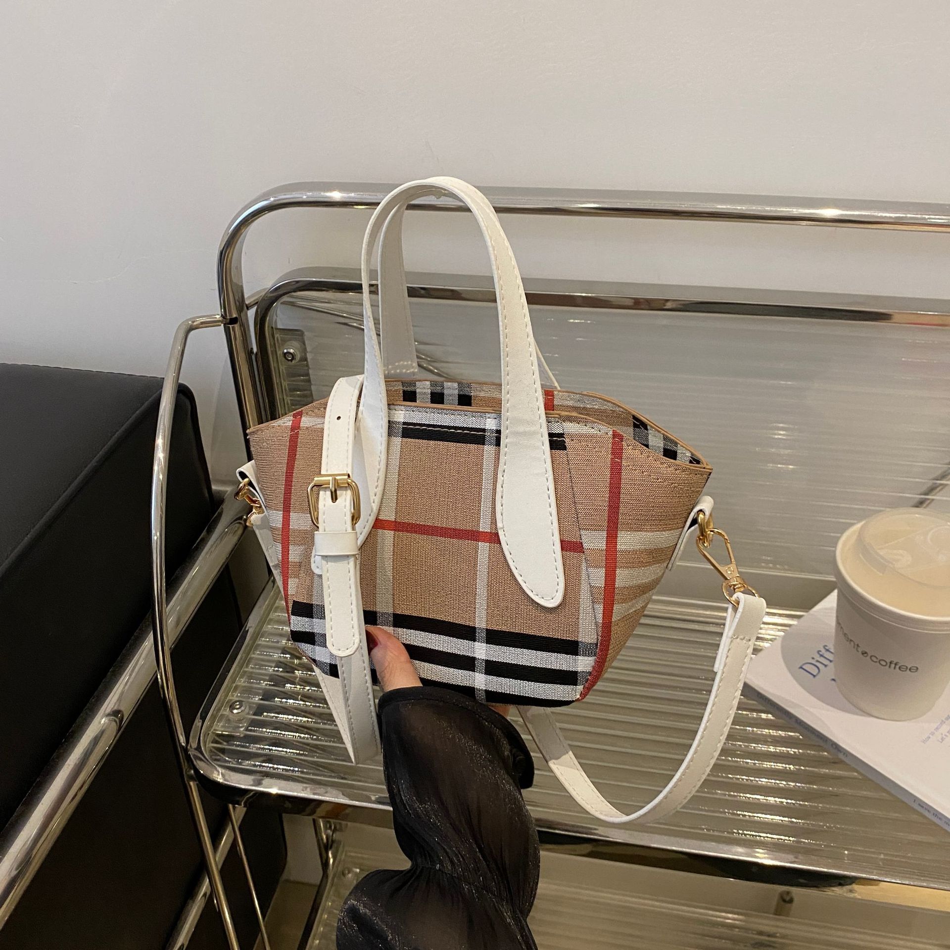 Elegant women's bag 2025 minimalist design new shoulder bag versatile high-end striped splicing handbag black white free shipping