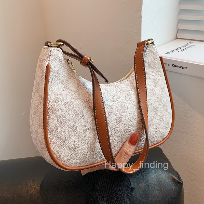 Small bag female new fashion French minority design advanced feeling single shoulder armpit bag handle stick bag