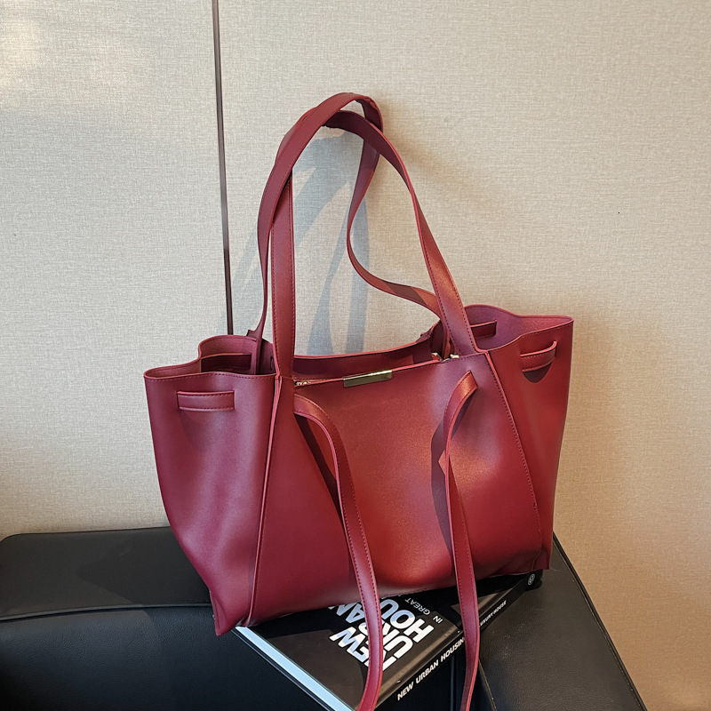 2025 New Versatile Casual Large Capacity Simple Solid Color Tote Bag For Women Retro Luxury Designer Bag Bag High-quality Texture Niche Shoulder Bag