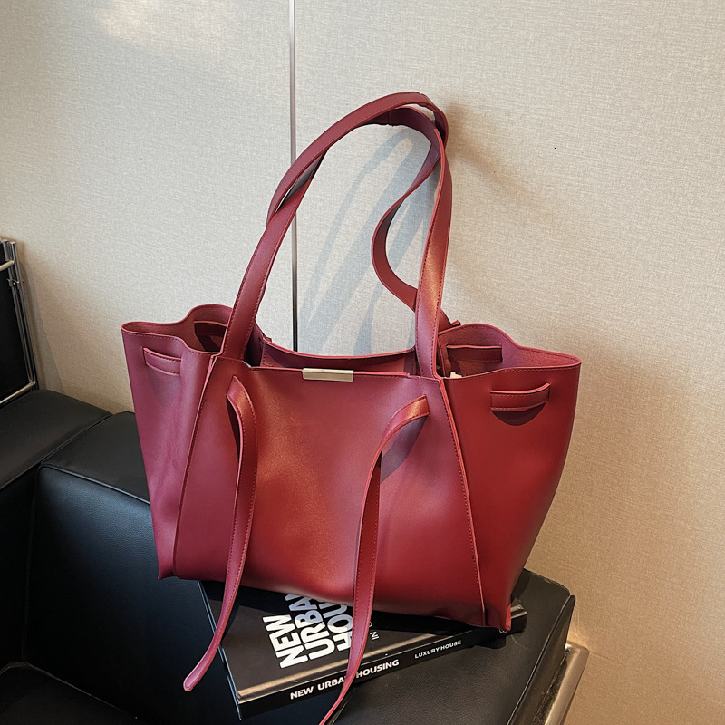 2025 New Versatile Casual Large Capacity Simple Solid Color Tote Bag For Women Retro Luxury Designer Bag Bag High-quality Texture Niche Shoulder Bag