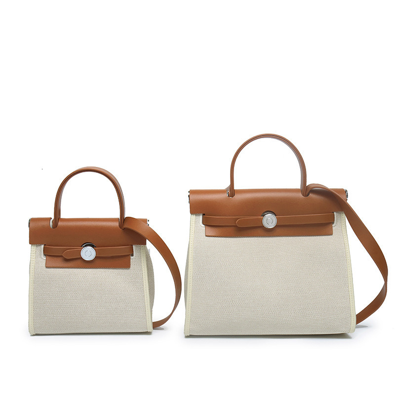 Splicing Canvas Cowhide New Tote Bag Senior Sense of Elegance and Light Single Shoulder Handbag Crossbody Leather Women's smile