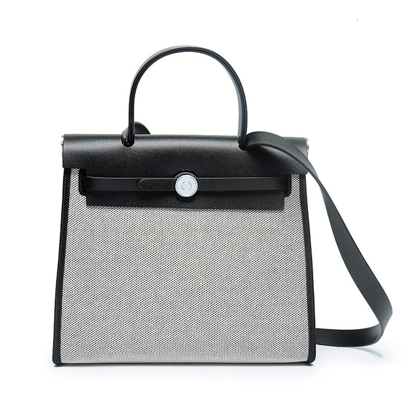 Splicing Canvas Cowhide New Tote Bag Senior Sense of Elegance and Light Single Shoulder Handbag Crossbody Leather Women's smile