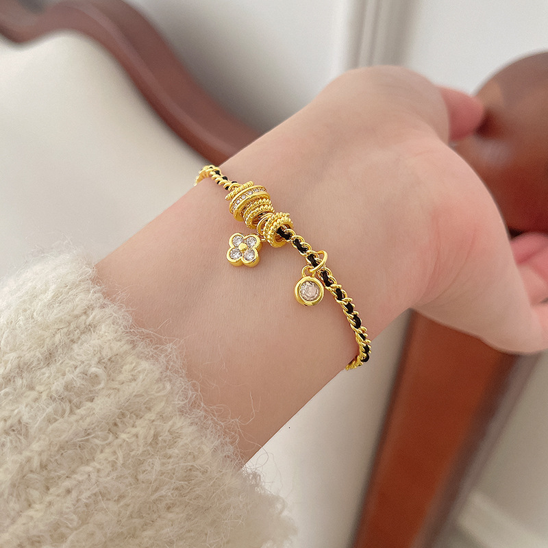 New Style -Inspired Black Gold Four-Leaf Clover Zircon Bracelet Vintage Elegant Weaving Running Ring Jewelry for Women - view 3