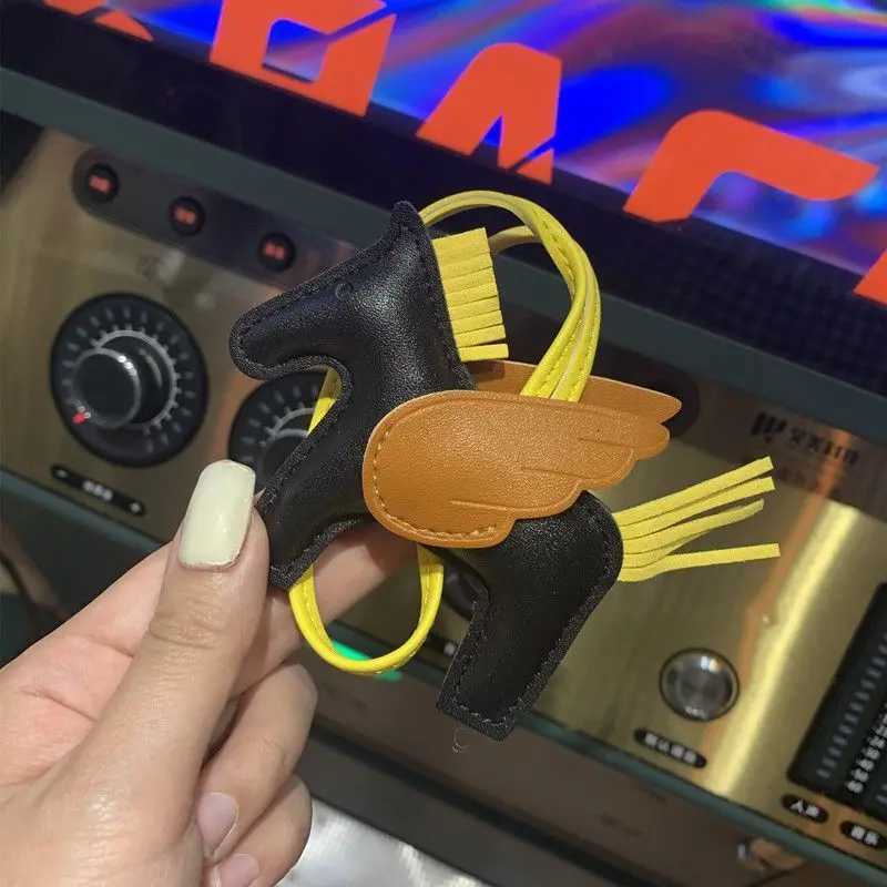 Designer Mini Angel Pegasus Pony Pendant Handmade ing WenS Bag Charm With Cute Tassel Fashion Accessory Birthday Gift G250825