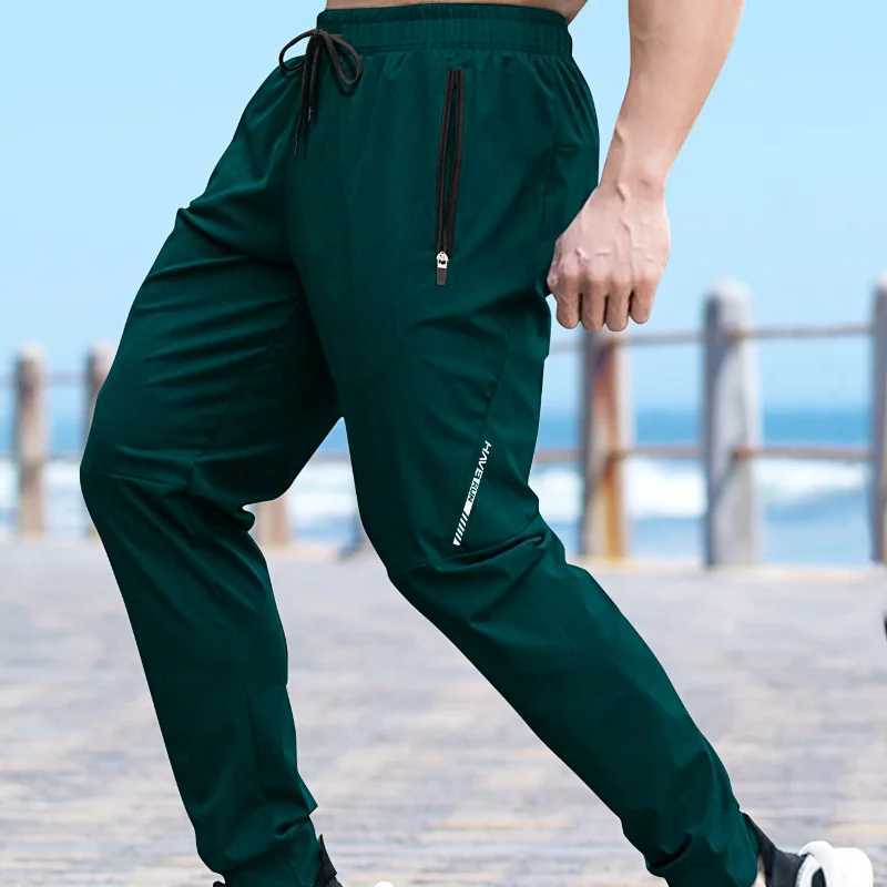 Mens Gym Pants Track Pants Summer Men Clothing Men Fashion Brand Casual Tracksuit for Men Quickdrying Pants Sweatpants Joggers W250826