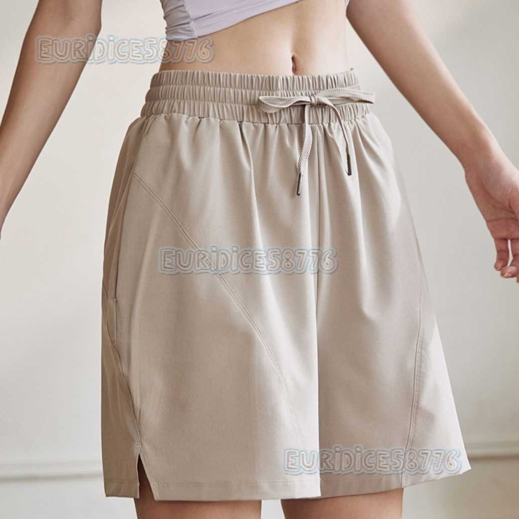 2025 Womens Sports Shorts Antiexposure Loose Yoga Pants Running Training Fivepoint Shorts Breathable Casual Fitness Midlength Shorts H250825