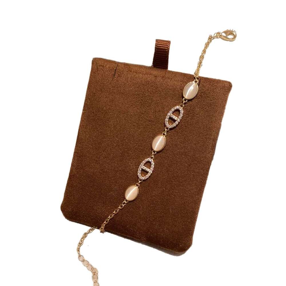 jewelry designer with dia inlaid oval high-end temperament bracelet Korean ins niche sweet handmade Cat's Eye Stone accessories