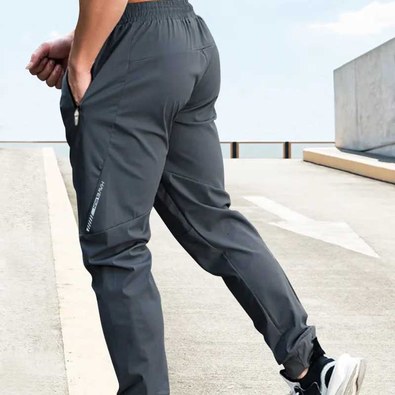Mens Gym Pants Track Pants Summer Men Clothing Men Fashion Brand Casual Tracksuit for Men Quickdrying Pants Sweatpants Joggers W250826