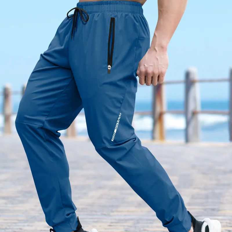 Mens Gym Pants Track Pants Summer Men Clothing Men Fashion Brand Casual Tracksuit for Men Quickdrying Pants Sweatpants Joggers W250826
