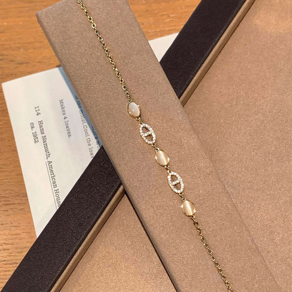 jewelry designer with dia inlaid oval high-end temperament bracelet Korean ins niche sweet handmade Cat's Eye Stone accessories