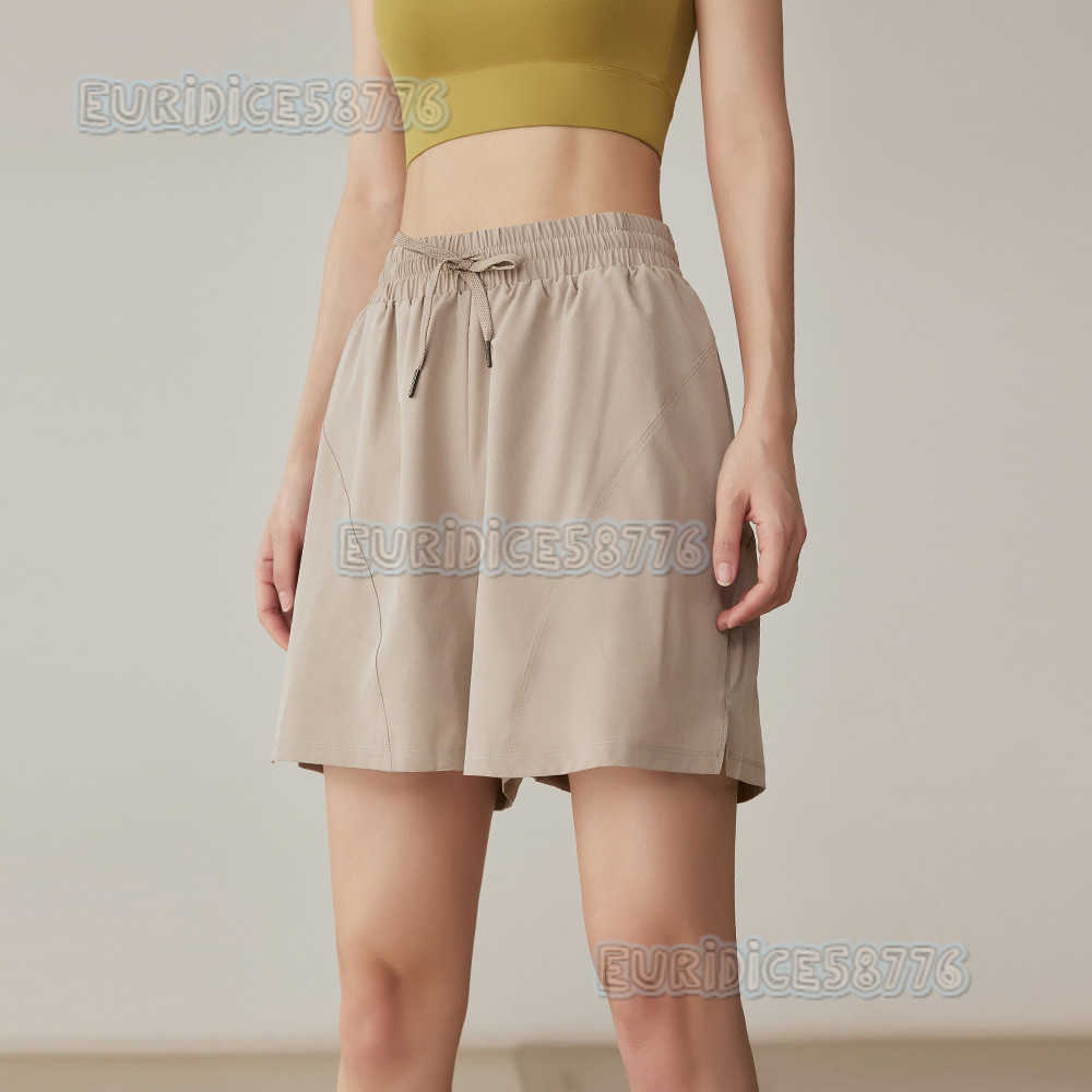 2025 Womens Sports Shorts Quickdry Summer Highwaist Loose Thin Badminton Shorts Fivepoint Yoga Fitness Midlength Shorts H250825