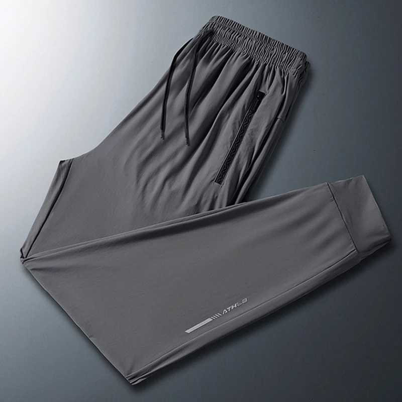 2024 Mens Versatile Stretch Quick Drying Pants Zipper Pocket Designer Casual Trousers Breathable Outdoor Joggers Summer Pants W250826