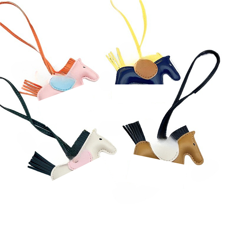 2025 new Women S Mini Bag Pendant Hand Sewn Sheepskin Angel Pegasus Keychain Creative Car Charm Gift Pony Pendant Designer