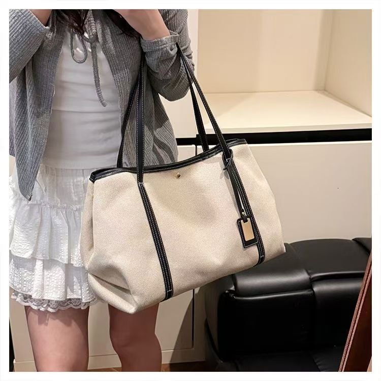 Large capacity handbag designer handbag 2025 new fashionable multifunctional commuting bag