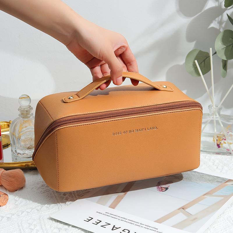 2025 Autumn New Makeup Bag Lightweight Women s Large Capacity Simple Portable bag elegant Bag Travel Supplies Storage Designer Handbag
