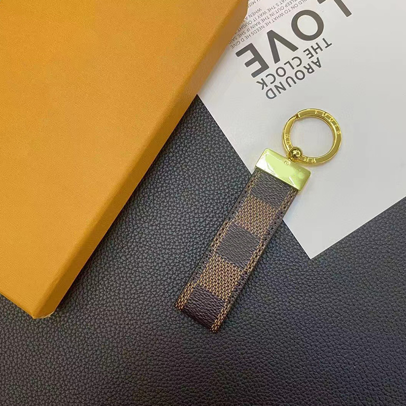 Key Rings Keychains Lanyards Designer Classic Exquisite Luxury High Quality Car Keyring Zinc Alloy Letter Unisex Lanyard Gold Black Metal Small Jewelry bag charm