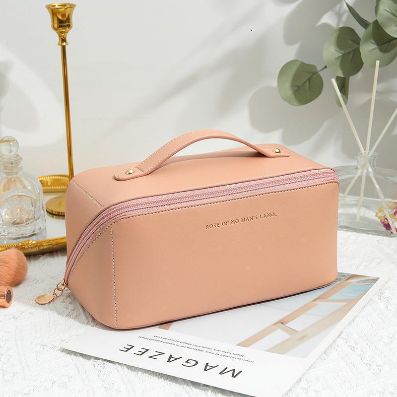 2025 Autumn New Makeup Bag Lightweight Women s Large Capacity Simple Portable bag elegant Bag Travel Supplies Storage Designer Handbag