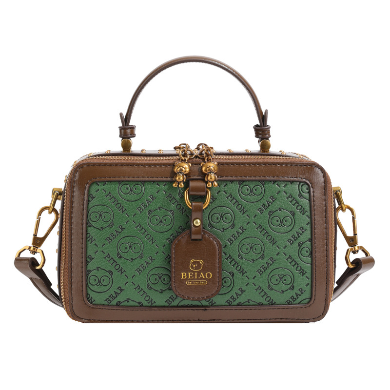 This small square box bag is a niche design for women versatile embossed and can be carried diagonally on one shoulder with a high-end feel