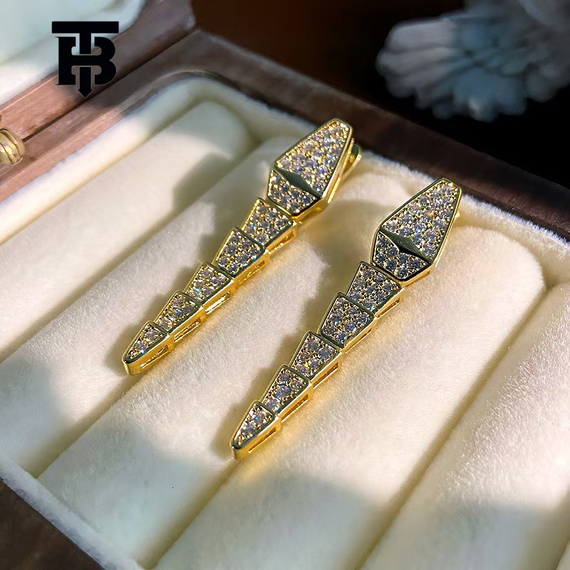 Free Shipping For New Designer Accessories Creative Personality High-end Copper Inlaid Zircon Snake Series Earrings Exquisite Light Luxury Temperament Simple