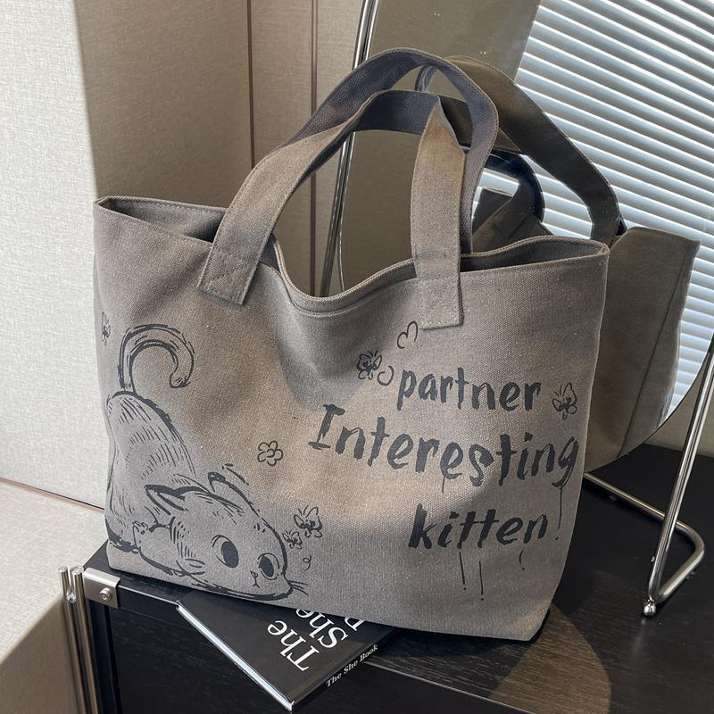 2025 Autumn New Student Commuter Single Shoulder Handbag Handbag Simple and Cute Cartoon Large Capacity Women's Single Shoulder Bag bag Designer 