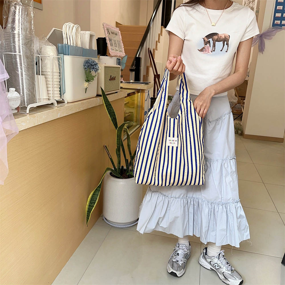 2025 Autumn New Striped Women's Canvas Handbag, Simple, Large Capacity, Lightweight, Commuter Diagonal Cross Bag, niche Designer bag Shoulder Bag