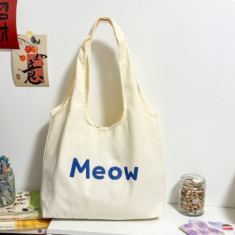 2025 Autumn New Canvas bag Bag College Student Commuting Canvas Bag White Leisure Large Capacity Handbag Designer Canvas Bag Women's Shoulder Bag