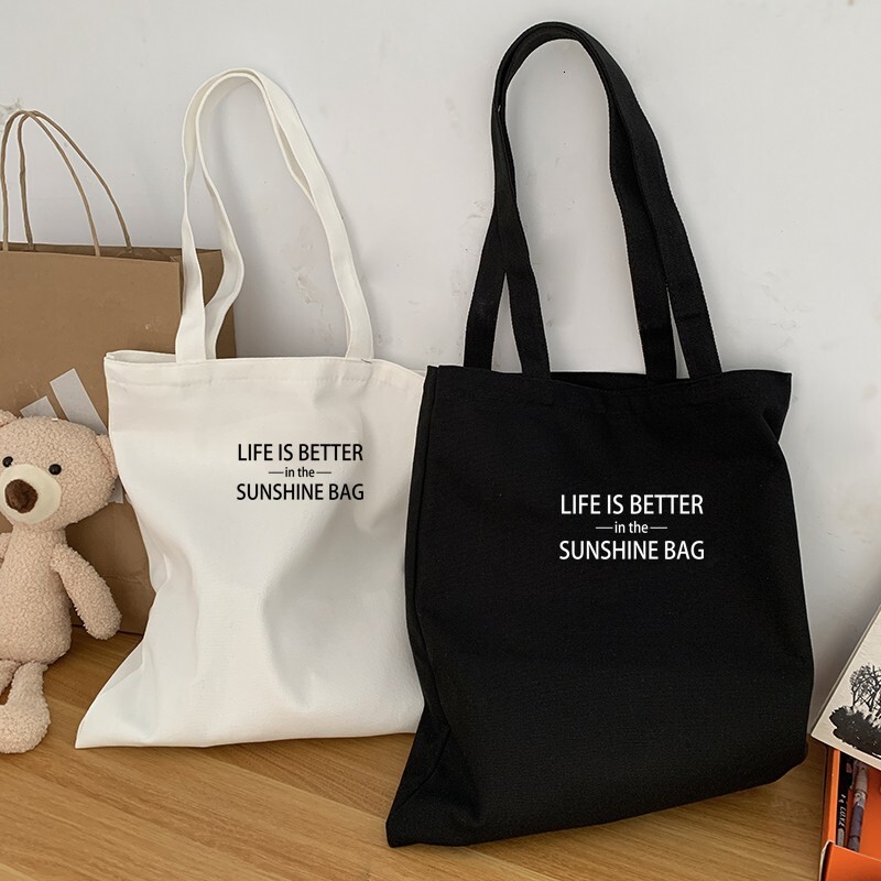 2025 autumn new minimalist letter canvas tote bag zipper shoulder bag bag casual niche designer shoulder bag women's canvas bag
