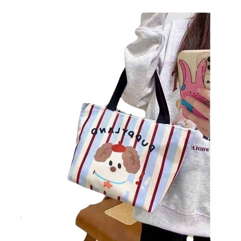 2025 autumn bag new minimalist style fashionable niche design handheld cute puppy style lightweight college canvas bag designer handbag