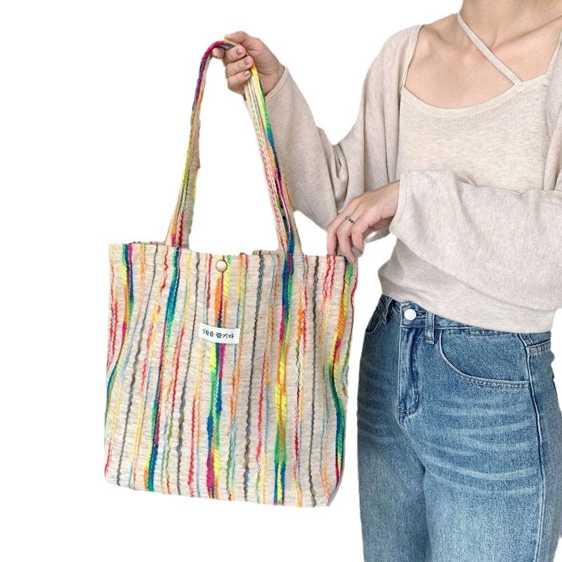 2025 autumn new forest style niche rainbow striped casual shoulder bag canvas bag simple class commuting large capacity bag designer canvas bag