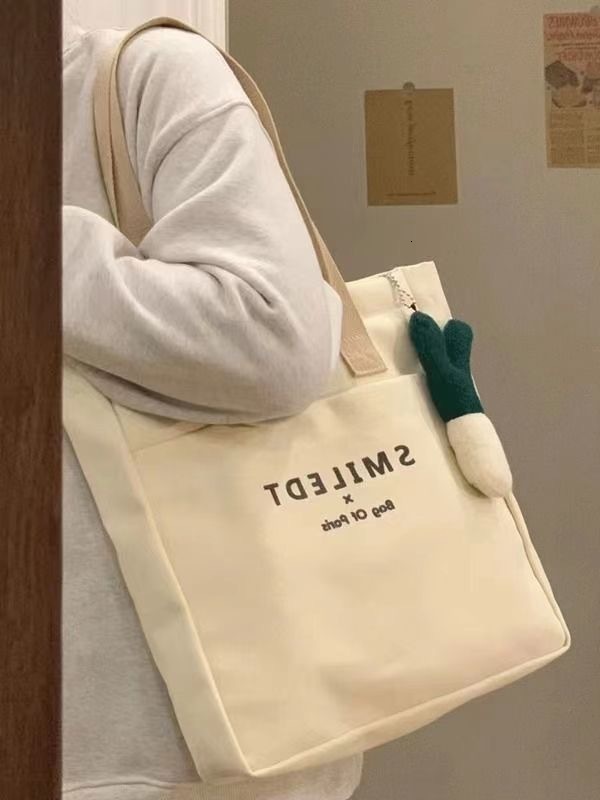 2025 Autumn New Female College Students' Simple Canvas Bag, Casual Style, bag niche Design, Shoulder Bag, Large Capacity Commuting Handbag, Desig