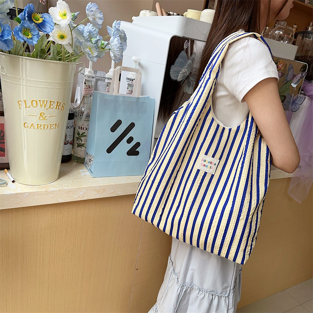 2025 Autumn New Striped Women's Canvas Handbag, Simple, Large Capacity, Lightweight, Commuter Diagonal Cross Bag, niche Designer bag Shoulder Bag