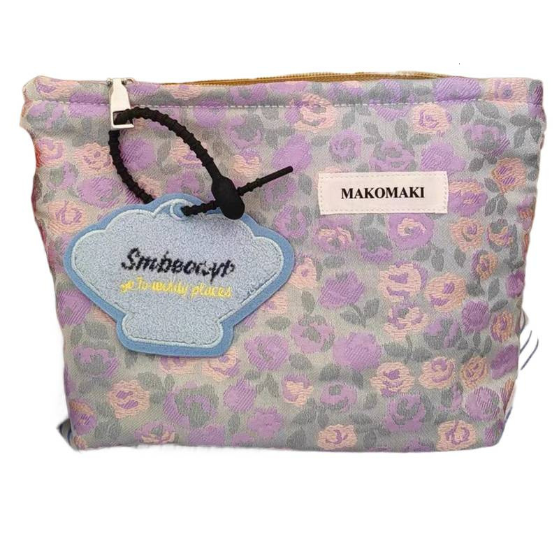 2025 autumn new purple grape light luxury makeup bag niche design outdoor elegant toiletries lightweight skincare bag storage bag designer handbag