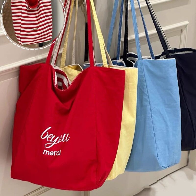 2025 autumn new striped canvas bag bag, Korean version handbag, casual, simple, niche, lightweight, large capacity, available with designer shoulder b