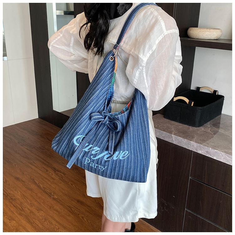 2025 autumn new Korean version niche fashion lazy bag style simple denim underarm bag double-sided usable shoulder bag designer canvas bag