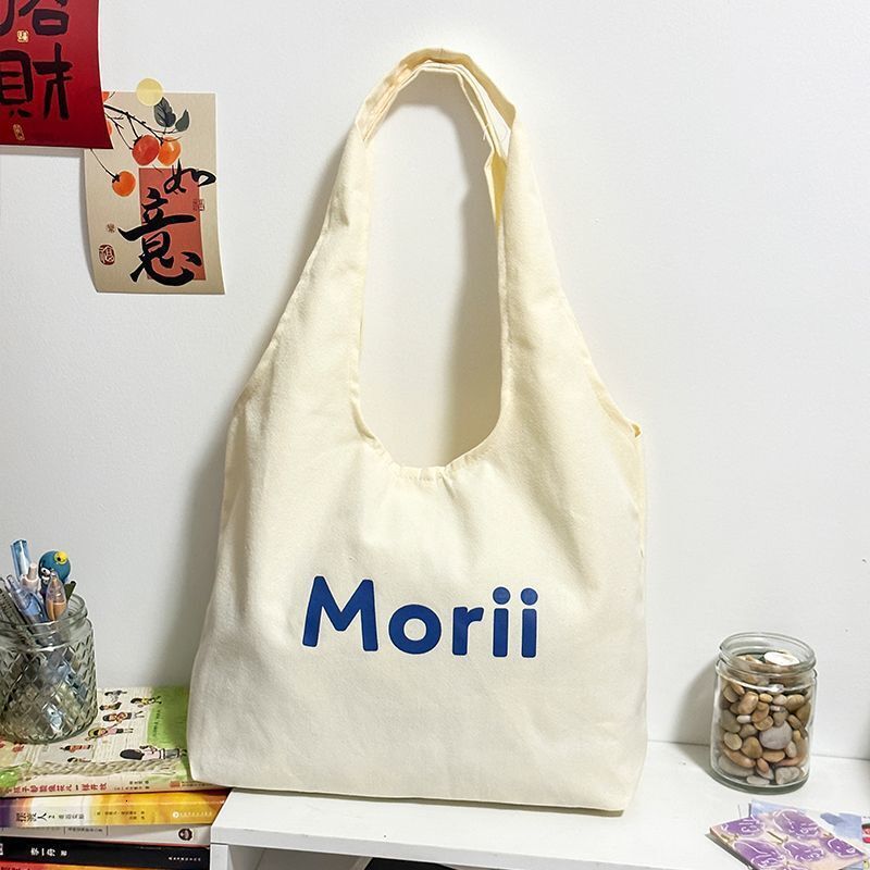 2025 Autumn New Canvas bag Bag College Student Commuting Canvas Bag White Leisure Large Capacity Handbag Designer Canvas Bag Women's Shoulder Bag