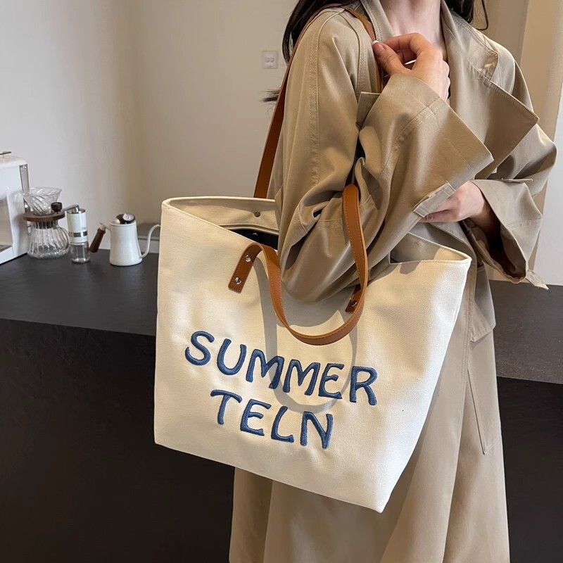 2025 Autumn New Women's Embroidered Letter Canvas Bag bag Large Capacity Commuter Handbag Single Shoulder Student Leisure Designer Single Shoulde