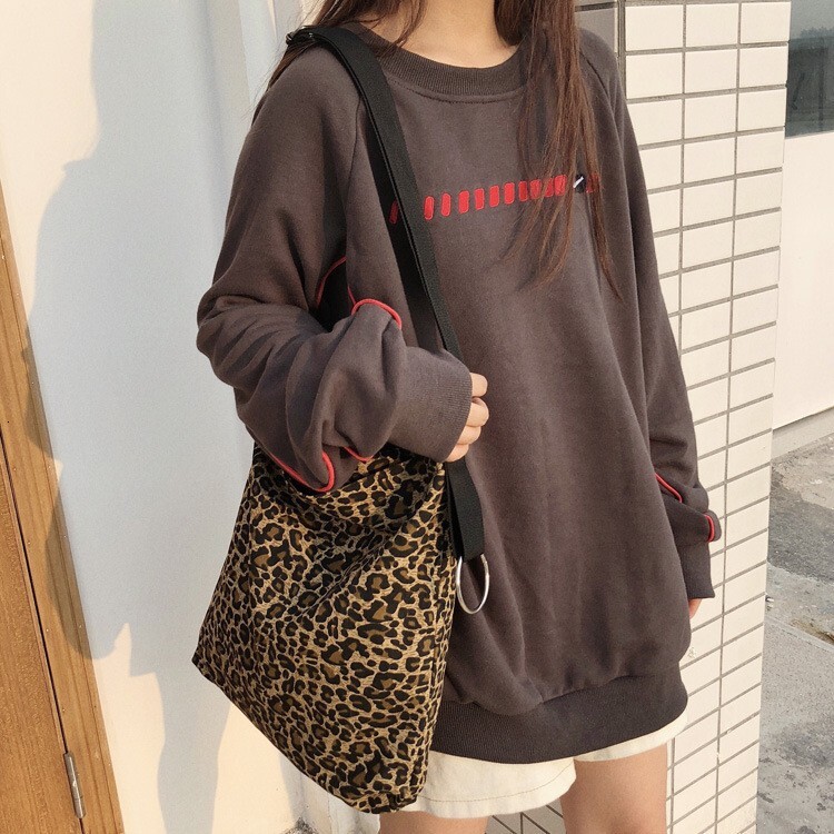 2025 autumn new leopard print simple niche women's fashion leopard print cloth bag Korean casual fashion student shoulder bag designer bag canvas