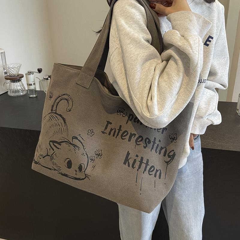 2025 Autumn New Student Commuter Single Shoulder Handbag Handbag Simple and Cute Cartoon Large Capacity Women's Single Shoulder Bag bag Designer 