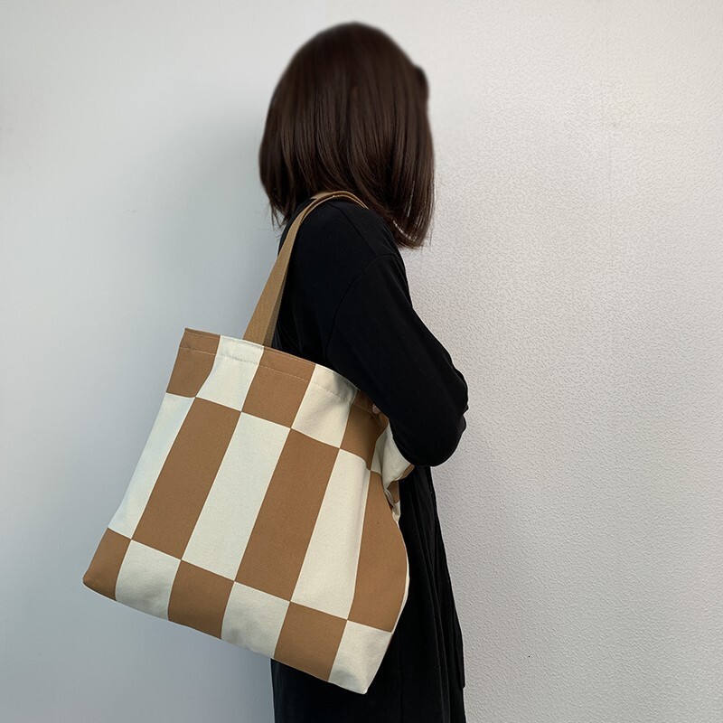 2025 Autumn New Women's bag Single Shoulder Canvas Bag Simple and niche Korean style Zipper Art Design Handheld Canvas Bag Designer Single Should