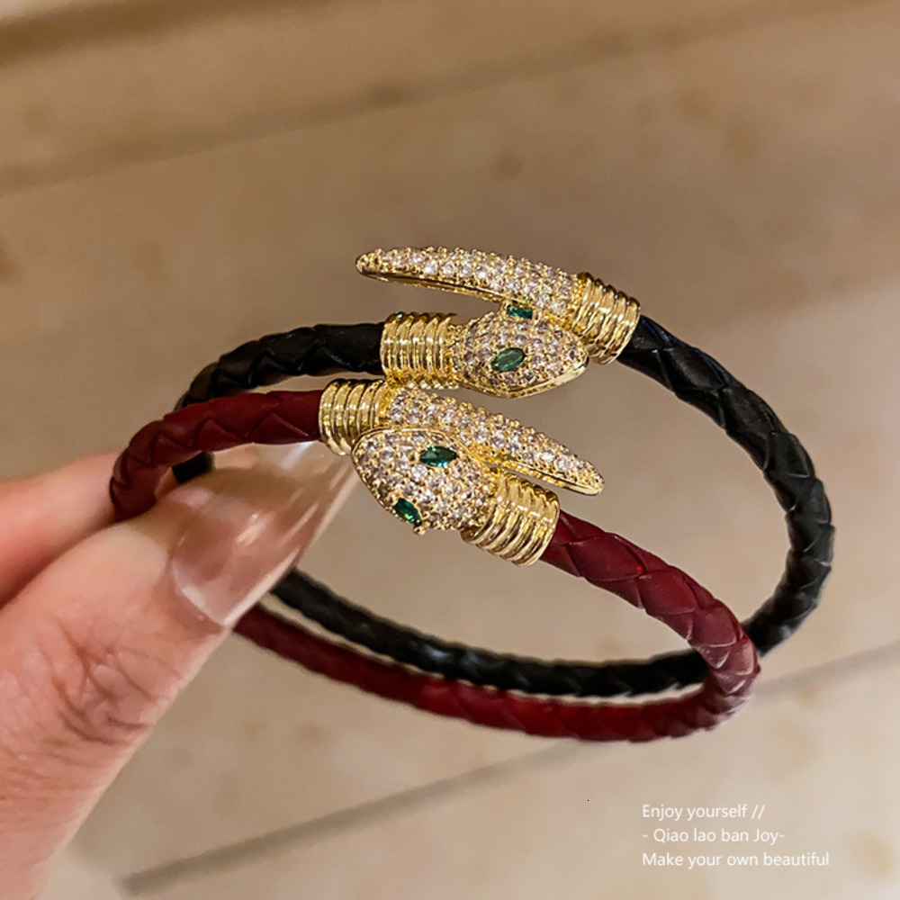Charm Bracelets Gold Tone Crystal Encrusted Snake Bracelet With Green Eye Details Stylish Fashion Jewelry And Gift For Him High Quality And Unique Accessory