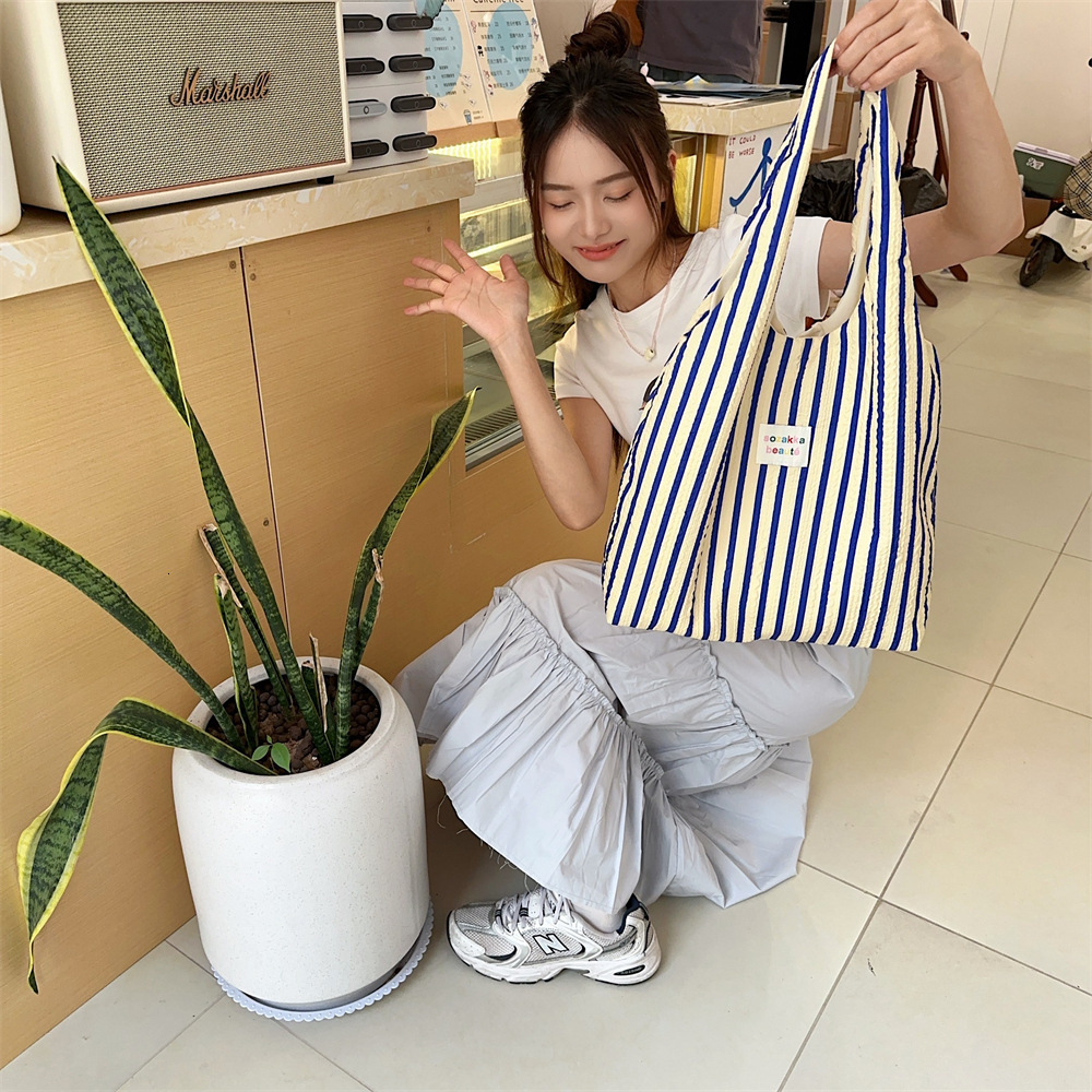 2025 Autumn New Striped Women's Canvas Handbag, Simple, Large Capacity, Lightweight, Commuter Diagonal Cross Bag, niche Designer bag Shoulder Bag