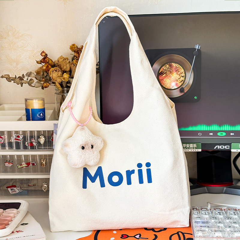 2025 Autumn New Canvas bag Bag College Student Commuting Canvas Bag White Leisure Large Capacity Handbag Designer Canvas Bag Women's Shoulder Bag