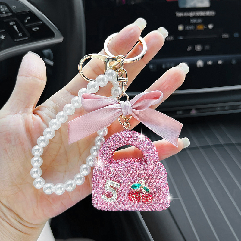 Designer Camellia tassel bag charms shoulder bag Korean pearl chain clothing car accessories keychain